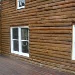 The three bottom log tiers are rotted on the outside and need to be repaired.